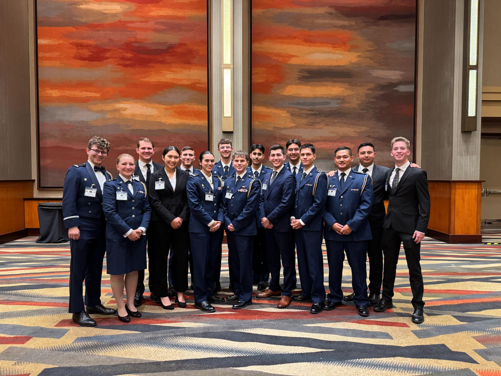 The sixteen students of the Robinson Risner Squadron national headquarters, in dress blues at National Conclave